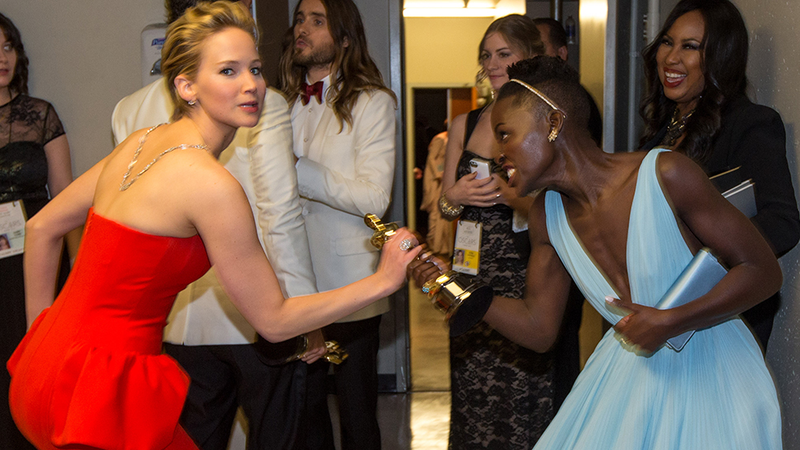 Illustration for article titled JLaw Tried to Steal Lupita's Academy Award and More Oscars Gossip
